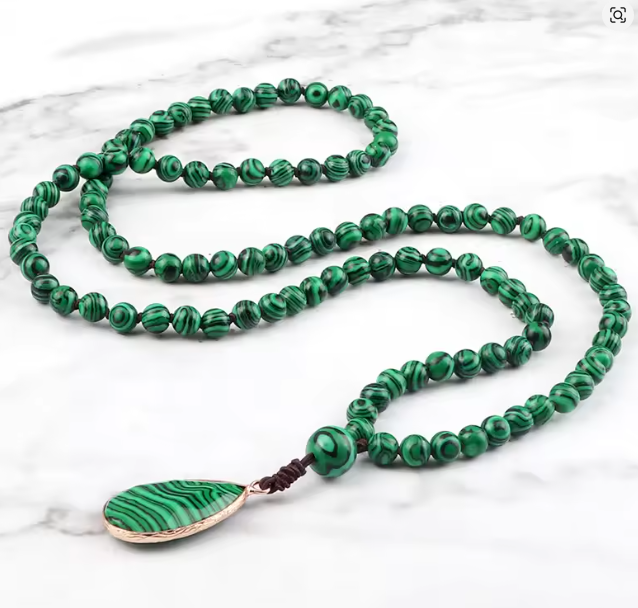 Verdea long malachite mala necklace with a gold-framed teardrop pendant